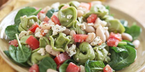 Spinach tortellini with beans and feta